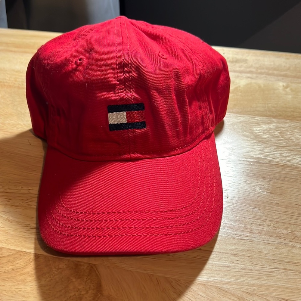 Red Tommy Hilfiger adjustable strapped hat, never worn.